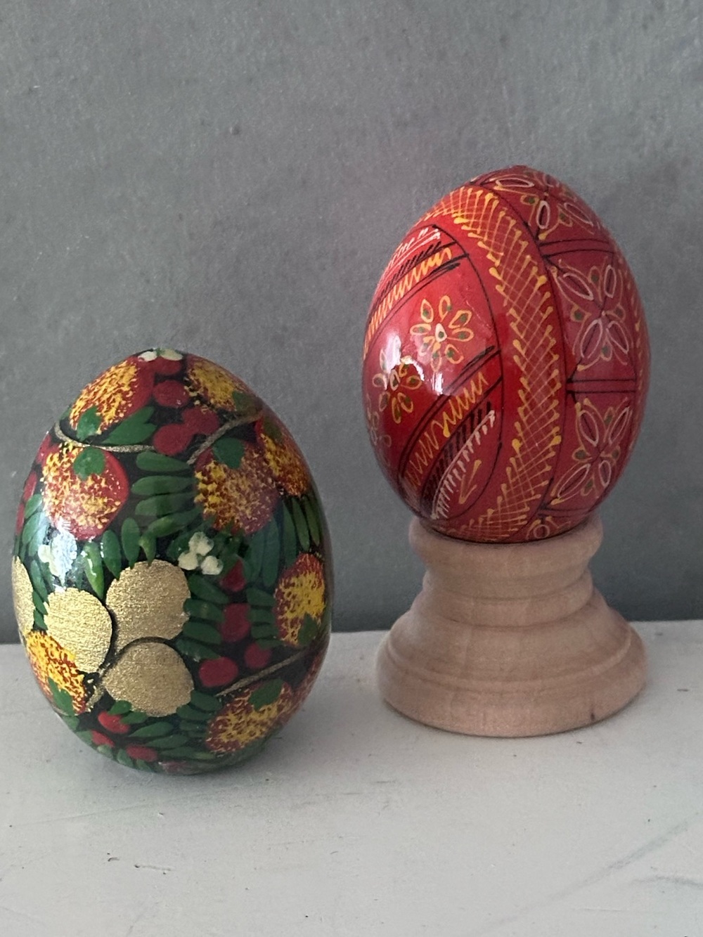 2 VINTAGE HAND PAINTED WOOD EGGS